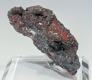 Zunyite with Hematite.