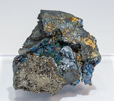 Chalcocite with Bornite after Chalcocite and Pyrite.