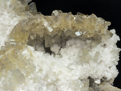 Baryte with Calcite, Dolomite and Fluorite. Detail with led light