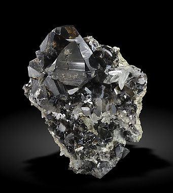 Cassiterite with Quartz. Side / Photo: Joaquim Calln