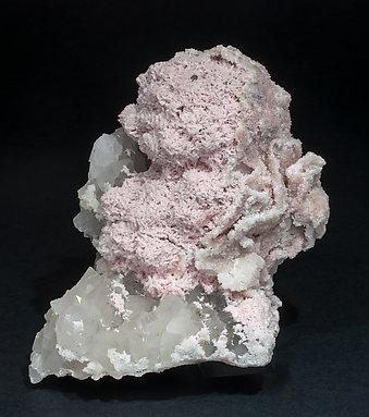 Rhodochrosite with Quartz and Rhodochrosite epitactic Quartz.