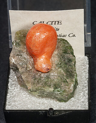 Calcite - melt - inclusion in Fluorapatite and with Fluorapatite.