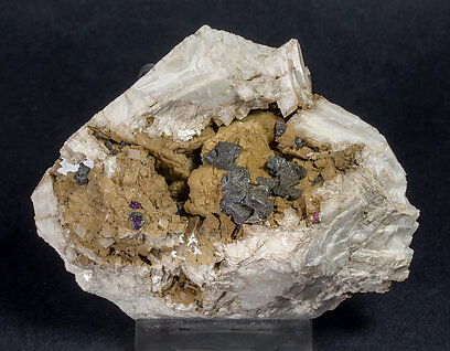 Chalcopyrite with Gypsum, Dolomite and Calcite.