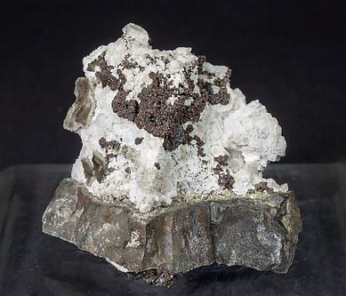 Nickeline with Calcite and Acanthite.