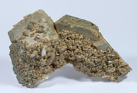 Siderite with Fluorapatite and Mica.