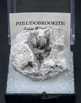 Pseudobrookite on Quartz. 