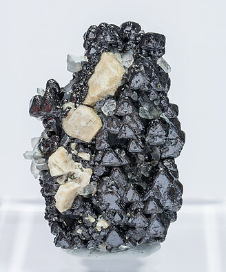 Magnetite (variety Ti-bearing) with Microcline and Quartz.