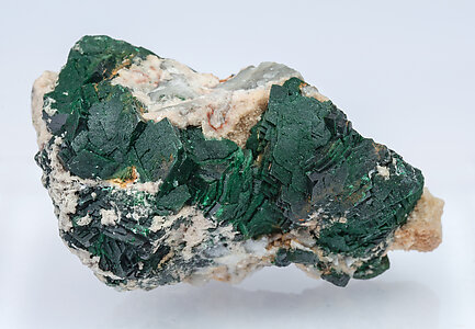 Malachite xx with Dolomite and Quartz. 