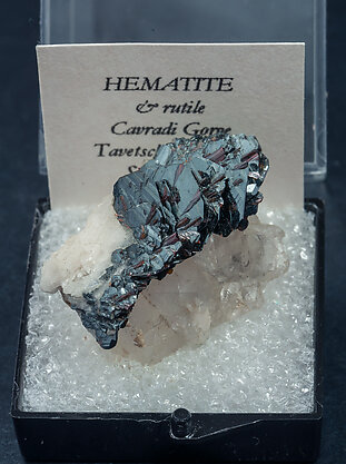 Hematite with Rutile, Albite and Quartz.