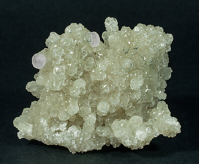 Prehnite with Calcite, Quartz (variety smoky) and Clinozoisite-Epidote (Series). 