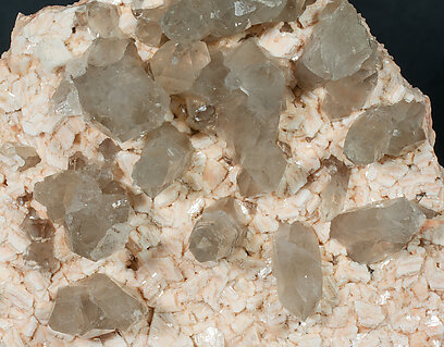 Orthoclase with Quartz (variety smoky). 