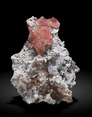 Fluorite (octahedral) with Quartz (variety smoky) and Albite.