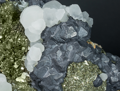 Pyrite after Pyrrhotite with Galena, Calcite, Quartz and Dolomite. 