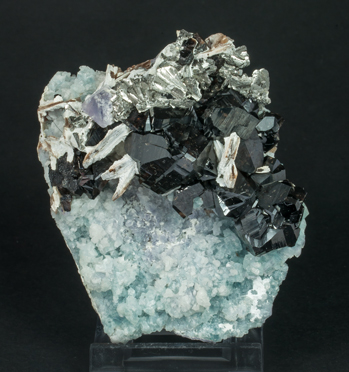 Cassiterite with Fluorite, Arsenopyrite and Mica. Side