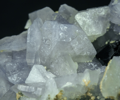 Fluorapatite with Ferberite, Siderite and Calcite-Dolomite. 