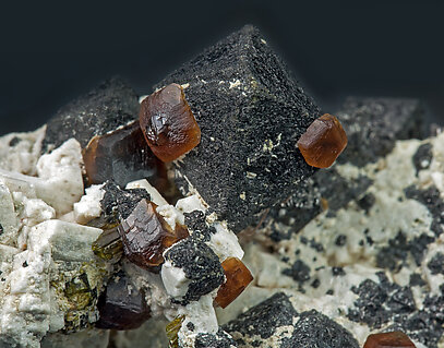 Magnetite with Microcline, Andradite and Epidote. 