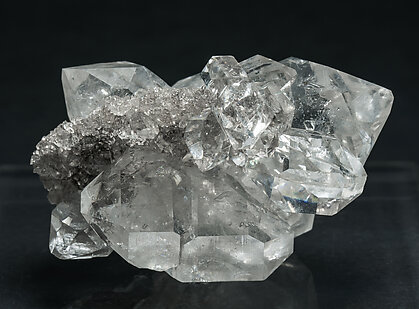 Quartz with hydrocarbon inclusions.