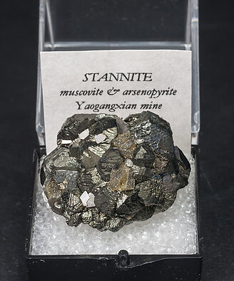 Stannite with Muscovite and Arsenopyrite. 