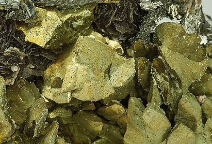 Chalcopyrite with Arsenopyrite, Pyrite and Muscovite. 