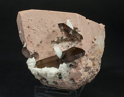 Microcline (twinned) with Quartz (variety smoky), Albite and Mica. Side