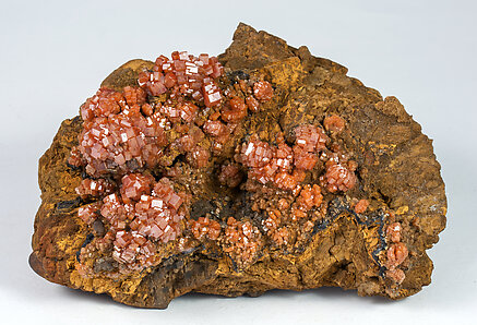 Vanadinite on Siderite.