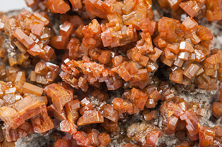 Vanadinite with manganese oxides and Quartz. 