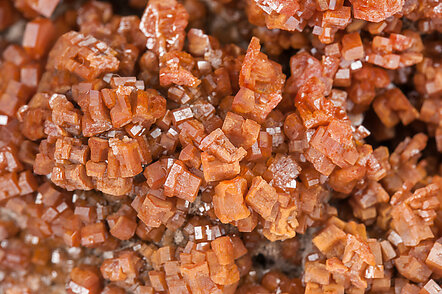 Vanadinite with manganese oxides and Quartz. 