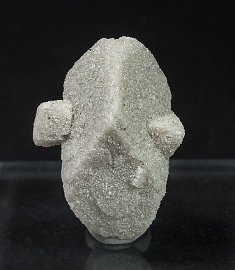 Calcite with sand inclusions. Rear