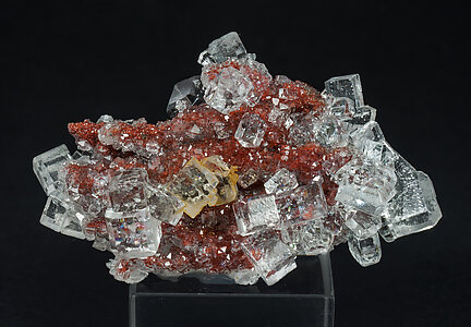 Fluorite on Quartz (variety red quartz). 