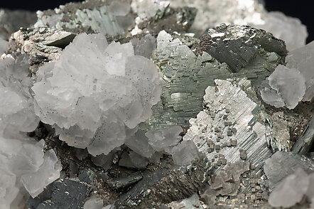 Marcasite with Arsenopyrite and Calcite-Dolomite. 