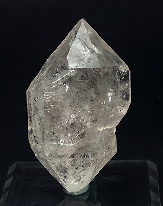 Quartz (doubly terminated) with Baryte and hydrocarbon inclusions. Front