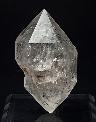 Quartz (doubly terminated) with Baryte and hydrocarbon inclusions. Rear