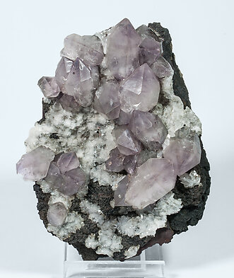 Quartz (variety amethyst) with Calcite.