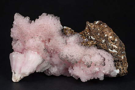 Calcite (variety Mn-bearing calcite) with Manganite.