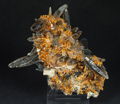 Zircon with Quartz (variety smoky), Orthoclase and Aegirine. 