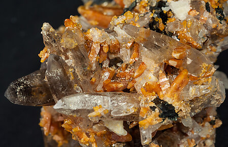 Zircon with Quartz (variety smoky), Orthoclase and Aegirine. 