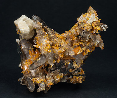 Zircon with Quartz (variety smoky), Orthoclase and Aegirine. 