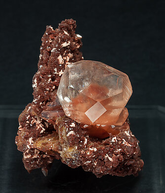 Calcite with Hematite inclusions.