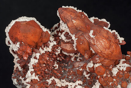 Quartz with Hematite inclusions, Calcite and Pyrite. 