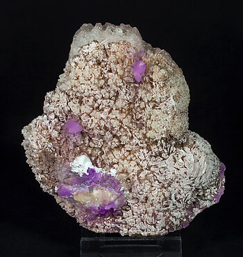 Talmessite coating Calcite and with Calcite (variety Co-bearing calcite).