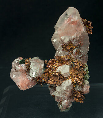 Copper and Calcite with Copper inclusions.