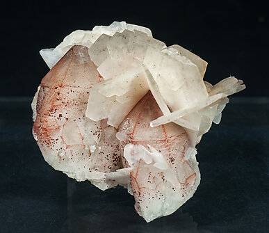 Calcite with Quartz and Hematite.