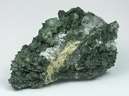 Fluorapatite with Titanite, Orthoclase (variety adularia) and Chlorite.