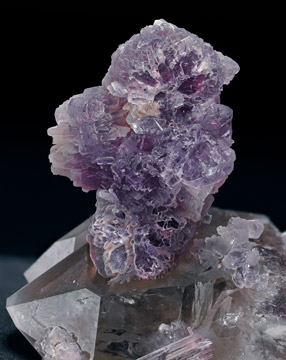 'lepidolite' on Quartz (variety smoky quartz). Photo: Joaquim Calln