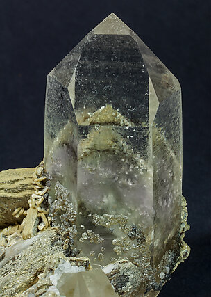 Siderite with Quartz, Siderite inclusions and Arsenopyrite. 