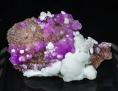 Talmessite with Calcite and Calcite (variety Co-bearing calcite).