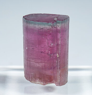 Elbaite (variety rubellite and blue cap). Front