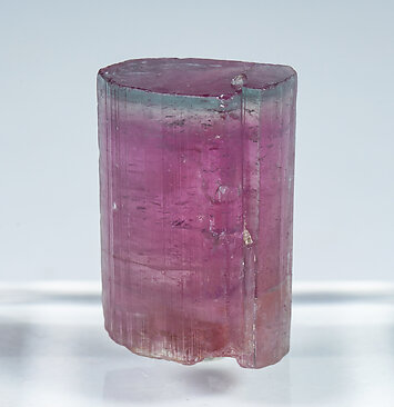 Elbaite (variety rubellite and blue cap). Front