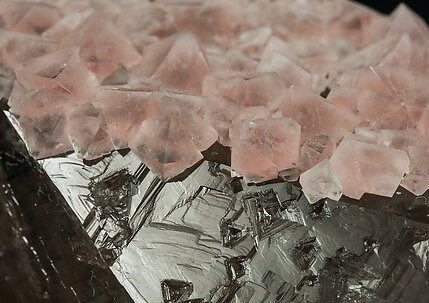 Fluorite (octahedral) with Quartz (variety smoky quartz). 