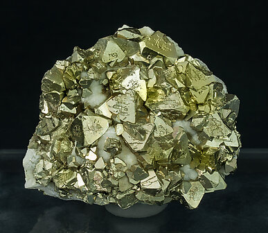 Pyrite (octahedral) with Calcite-Dolomite and Ferberite. 